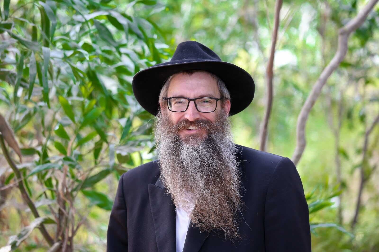 Rabbi Dror Shaul teaching at the Chabad House in Dharamsala